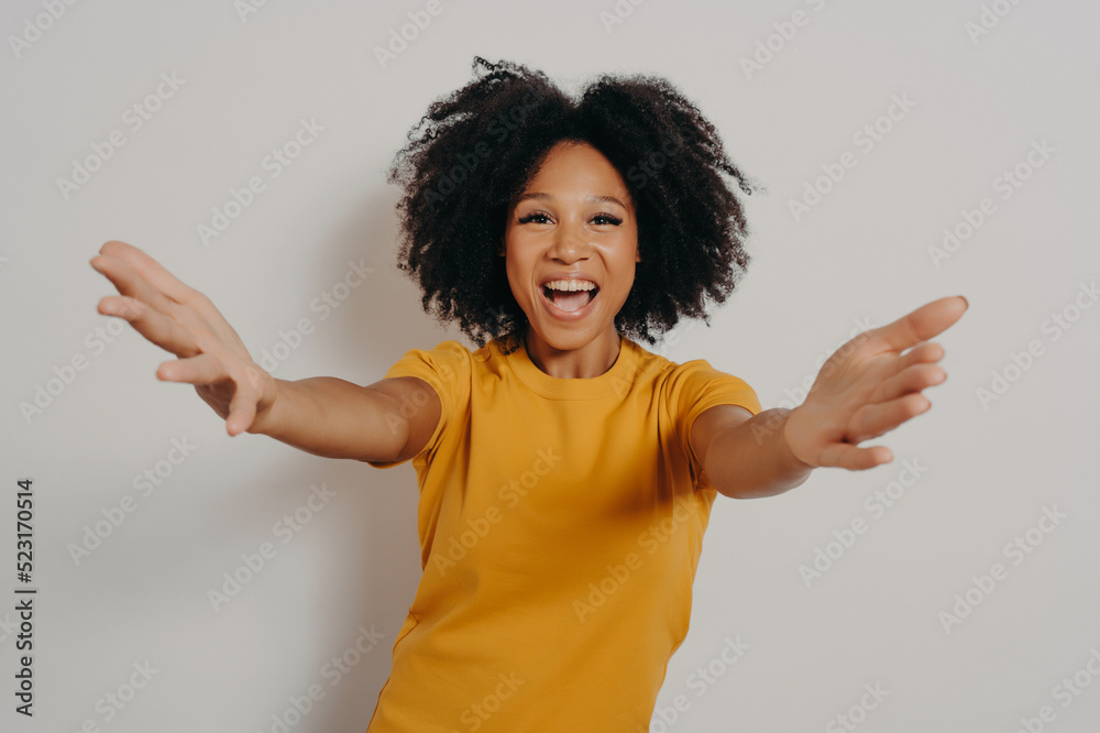 young overjoyed african lady stretching her arms and wants to hug, isolated over white background young overjoyed african lady stretching her arms and wants to hug, isolated over white background