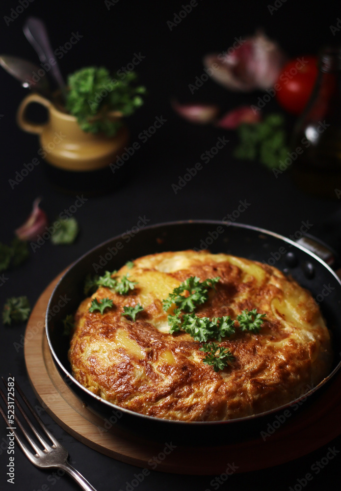 Traditional Spanish dish tortilla on the table Traditional Spanish dish tortilla on the table