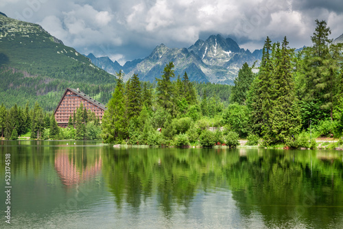 Forest and mountain lake in Strbske Pleso in Slovakia