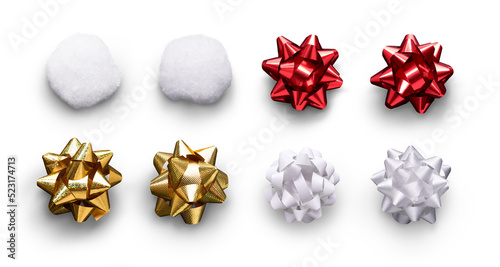 A collection of red, gold and white ribbon bows and gift, present wrapping decorations isolated against a transparent background.