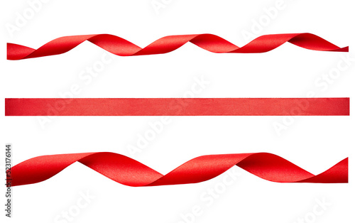 Obraz na płótnie A set of curly red ribbon for Christmas and birthday present isolated against a transparent background. w salonie