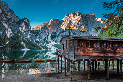 Old wooden hut and Lago di ...