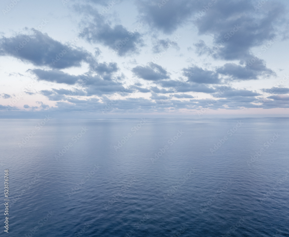 Aerial view of the calm sunrise over the ocean with copy space Aerial view of the calm sunrise over the ocean with copy space