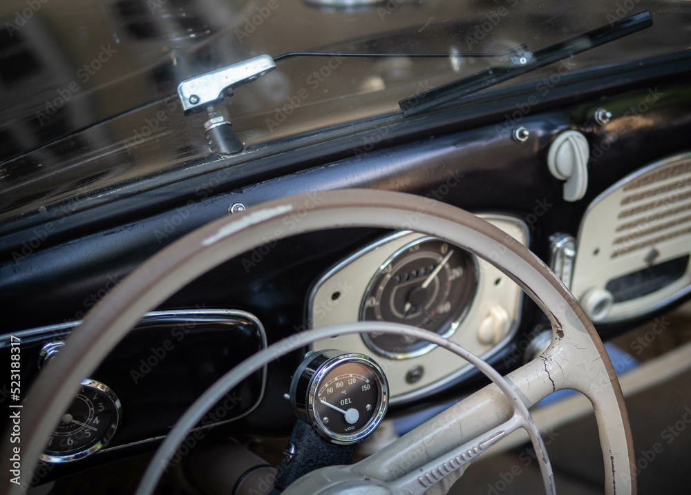 Dashboard and steering wheel of old-timer car Dashboard and steering wheel of old-timer car