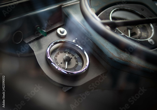 Dashboard and steering wheel of old-timer car