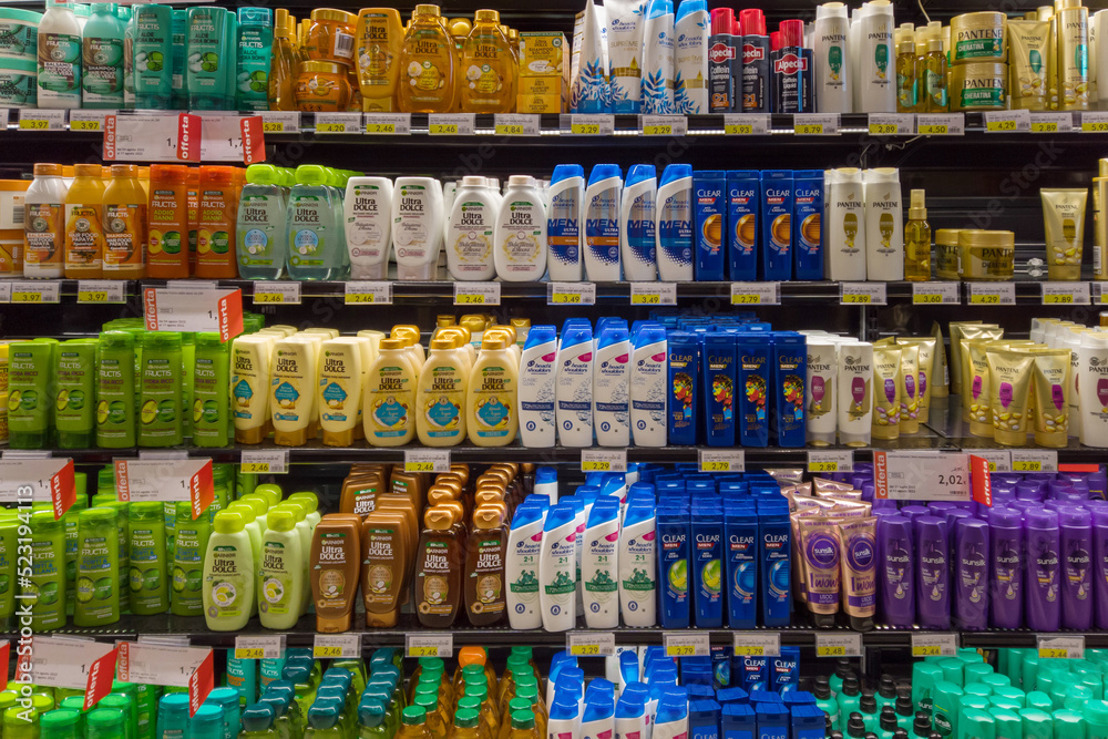 Fossano, Italy - August 11, 2022: Different brands and types of hair shampoo  for sale on the shelf of an Italian supermarket Photos | Adobe Stock