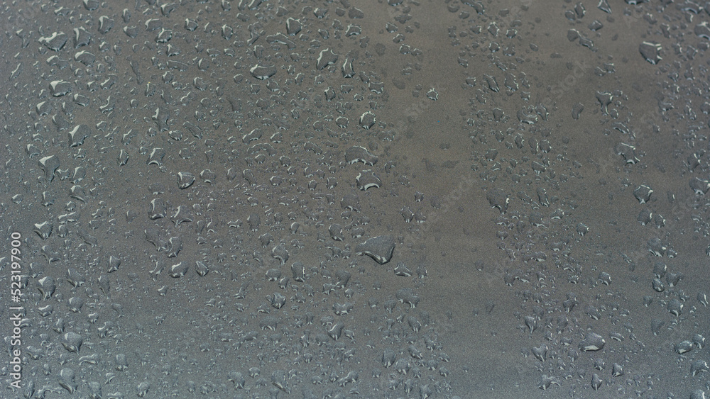 Raindrops on gray metal surface. Raindrops on gray metal surface.