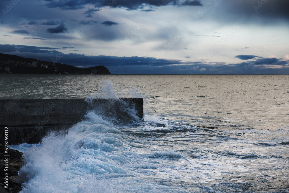 Storm at sea with waves during rain and cloudy in Alupka. Crimea