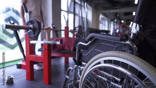 Wallpaper Mural Man in a wheelchair working out at the gym Torontodigital.ca