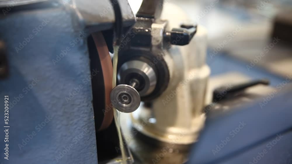 machine grinding of valves, close up machine grinding of valves, close up