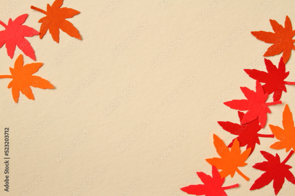 Frame of red leaves in autumn concept isolated on beige background. Flat lay, top view, copy space. Frame of red leaves in autumn concept isolated on beige background. Flat lay, top view, copy space.