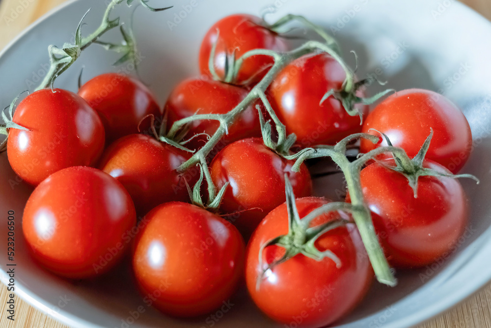 small red cherry tomatoes in a bowl
