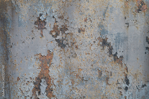 Shabby rusty metal fence as a background, old metal wall texture © Михаил Таратонов