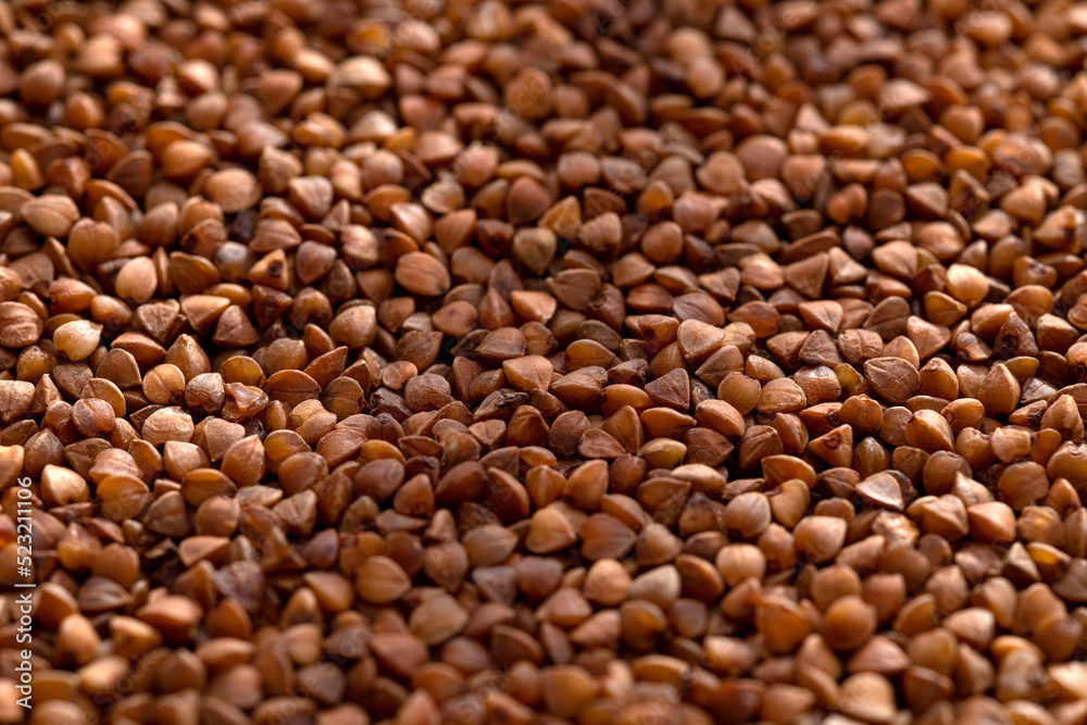 Buckwheat texture background. Natural healty food, vegan diet. Buckwheat texture background. Natural healty food, vegan diet.