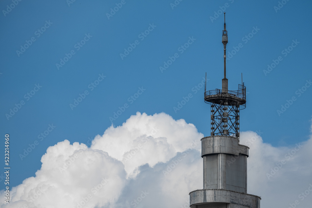 telecommunication tower on sky