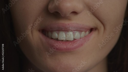 Close up of a caucasian woman confident smile in slow motion