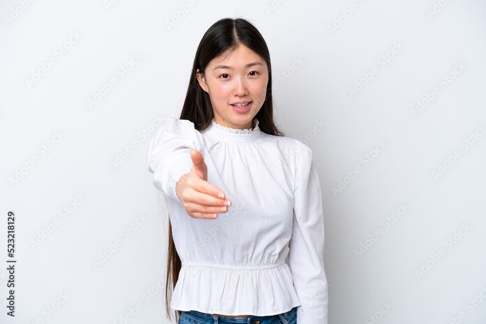 Young Chinese woman isolated on white background shaking hands for closing a good deal Young Chinese woman isolated on white background shaking hands for closing a good deal