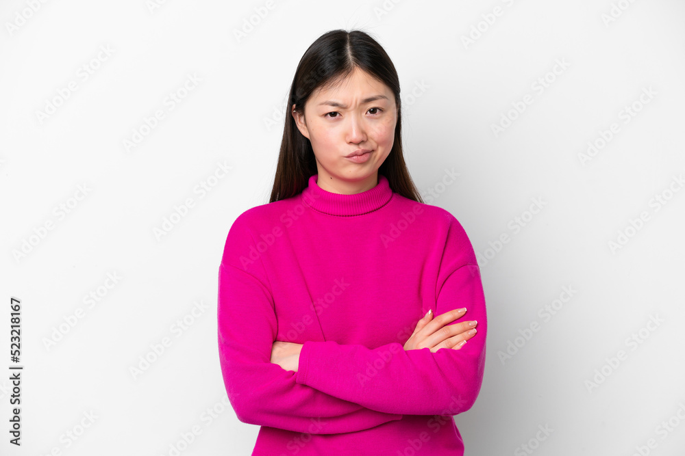 Young Chinese woman isolated on white background feeling upset Young Chinese woman isolated on white background feeling upset