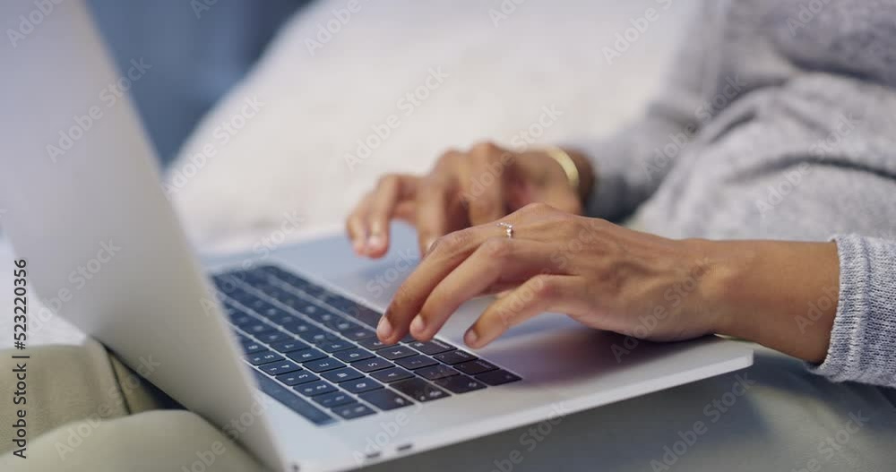 Hands typing on laptop, browsing the internet or searching online while relaxing on bed in home bedroom. Closeup of relaxed, lounging or comfortable woman or blogger preparing blog post on technology Hands typing on laptop, browsing the internet or searching online while relaxing on bed in home bedroom. Closeup of relaxed, lounging or comfortable woman or blogger preparing blog post on technology