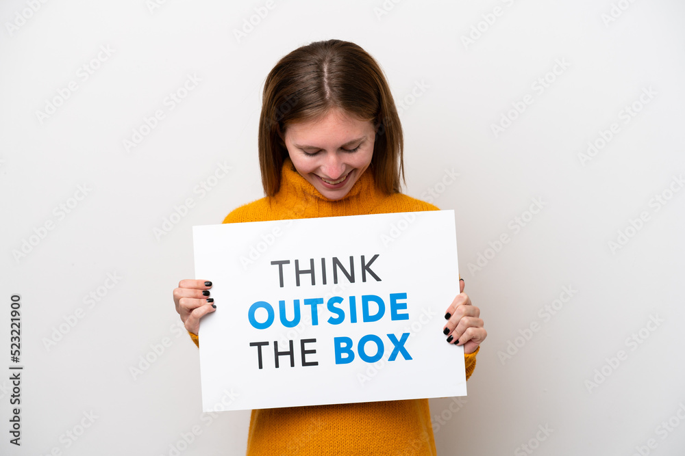 Young English woman isolated on white background holding a placard with text Think Outside The Box Young English woman isolated on white background holding a placard with text Think Outside The Box