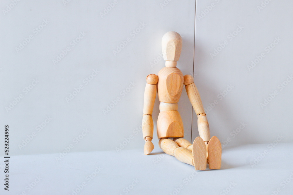 Concept of loneliness and abandonment with a wooden doll as a model
Concept of loneliness and abandonment with a wooden doll as a model