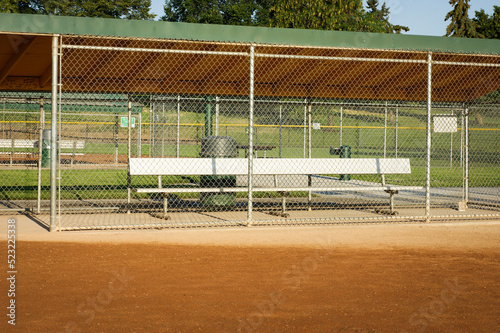 Dugout on empty baseball and softball field #523225338