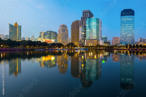 Bangkok Cityscape  Business district with Park in the City at dusk  Thailand 