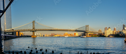 Wide Panoramic View of the Manhattan Bridge With Clear Skies Early in the Morning