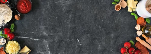 Panel kuchenny z motywem Pizza making ingredients including cheese, pepperoni, tomatoes and basil. Overhead view double border against a dark banner background. Copy space.