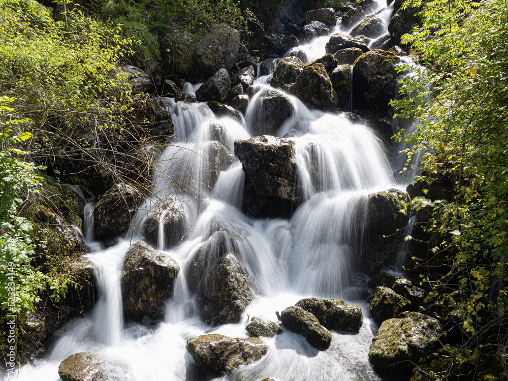 rapids of a river with vaporous water rapids of a river with vaporous water