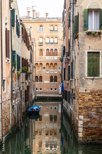 Valokuva Boats floating in the calm canals of Venice, Italy.