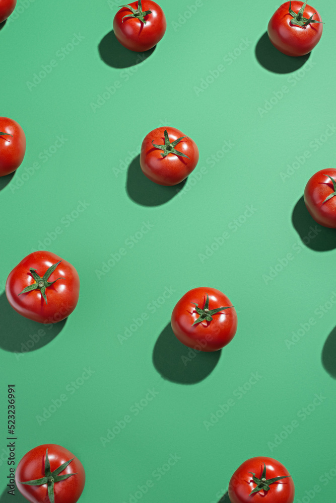 Green background pattern with red tomatoes Green background pattern with red tomatoes