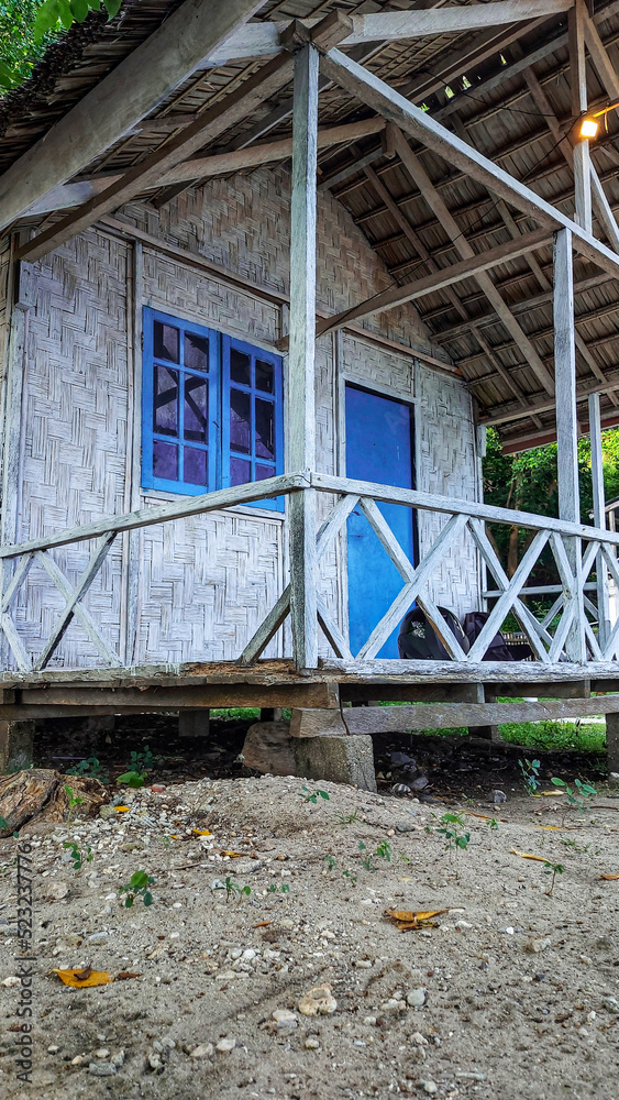 The wooden stilt houses are neatly lined up in the tourist area of ​​Biluhu Beach, East of Gorontalo City.  it is rented out to visitors who wish to stay overnight.  outdoor photo on august 13, 2022
