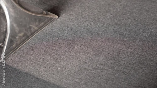 Cleaning sofa with water vacuum cleaner