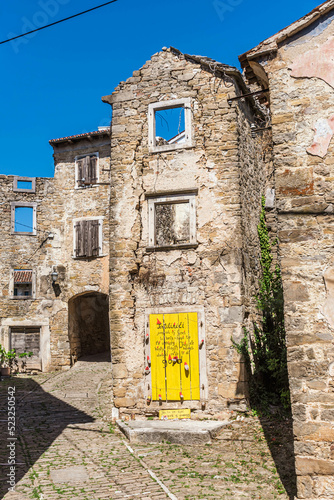 old houses in the medieval village of oprtalj, croatia photo