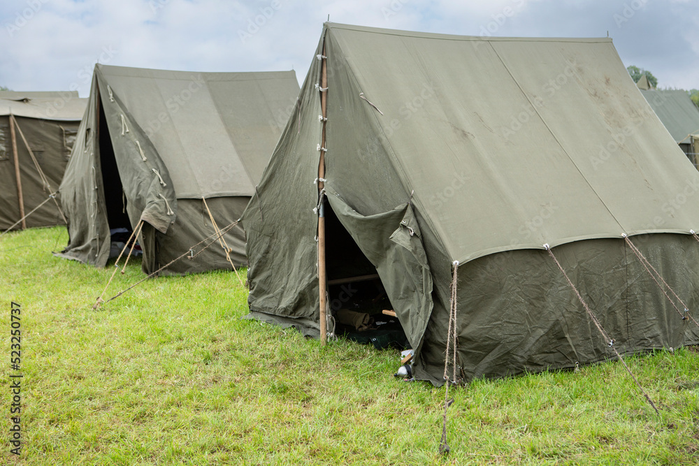 american army green canvas pitched tent's