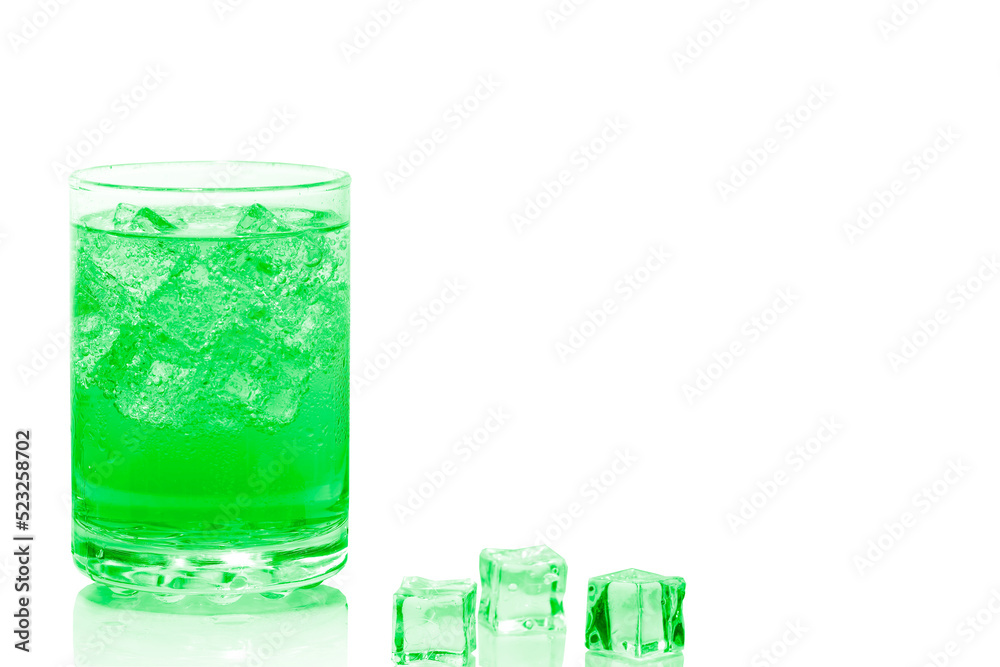 A glass of soft drink on lime soda with ice cubes isolate on white background. A glass of soft drink on lime soda with ice cubes isolate on white background.