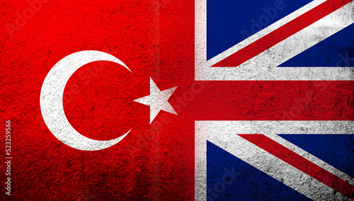 National flag of United Kingdom (Great Britain) Union Jack with National flag of Turkey. Grunge background