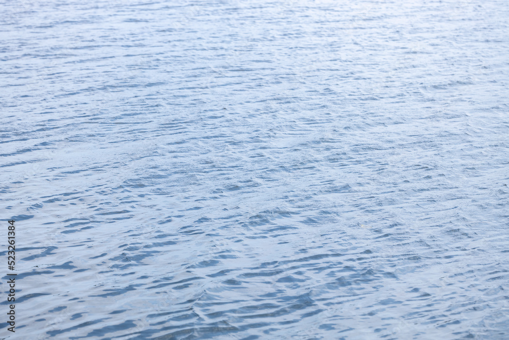 small waves on the water, blue tint of water on a sunny day small waves on the water, blue tint of water on a sunny day