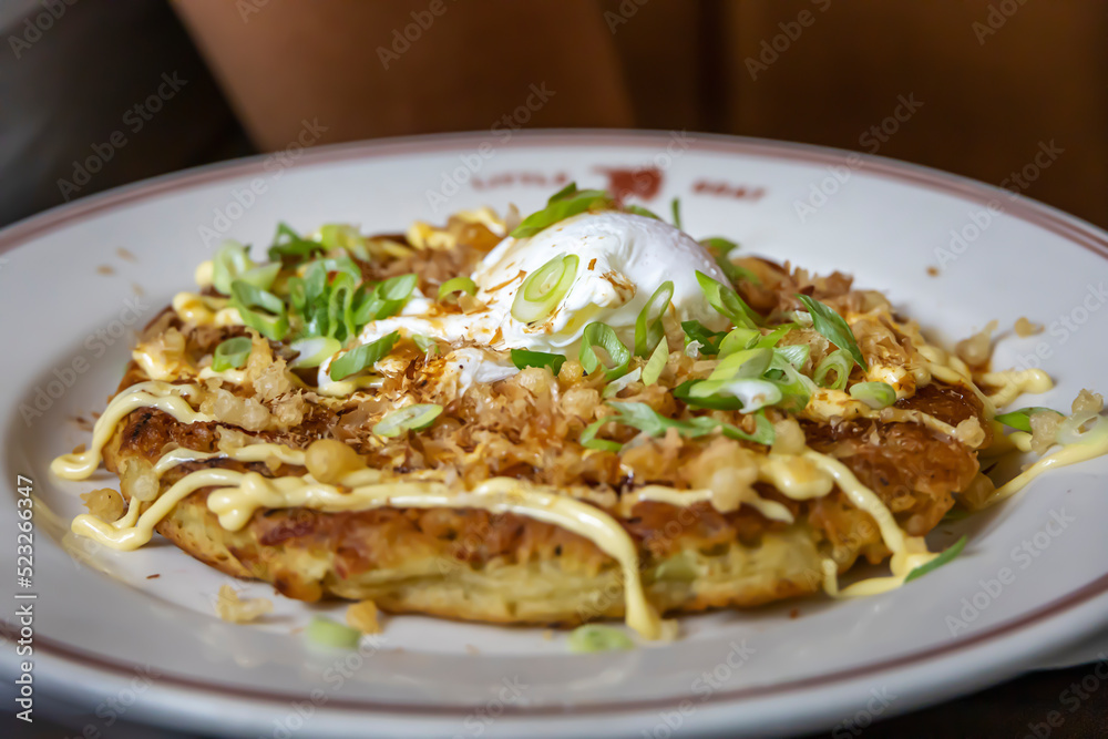 Scallion pancake with sour cream aioli at a restaurant Scallion pancake with sour cream aioli at a restaurant
