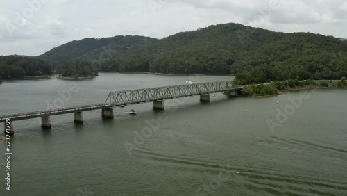 4K aerial view of Lake Allatoona in Georgia with view of Red top mountains and historical Bethany bridge over the lake. photo