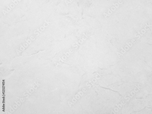 Rough white stone wall background in vintage style for graphic design or wallpaper