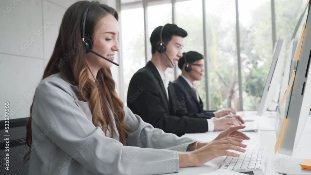 Busines man and woman callcenter team office working with laptop and earphone telesale and call center helpline concept