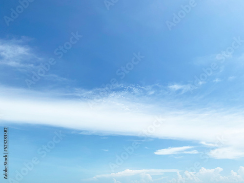 View of dense, heavy, big clouds and blue sky. © tassita
