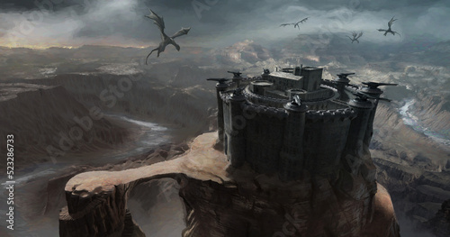 A castle fortress in a desert landscape surrounded by dragons flying in the sky. photo