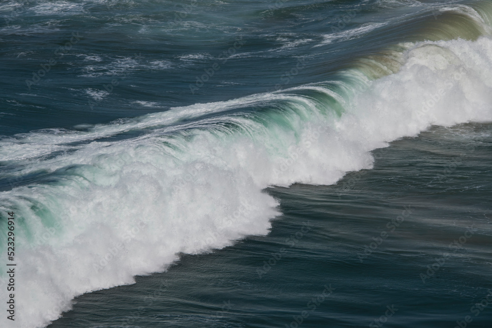 Cliffs in the stormy ocean waves Cliffs in the stormy ocean waves
