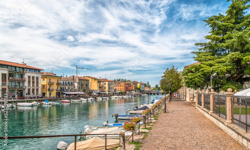 Peschiera del Garda town with harbor and boats view, Garda lake, Veneto region of northern italy, Europe - august 8, 2022 photo
