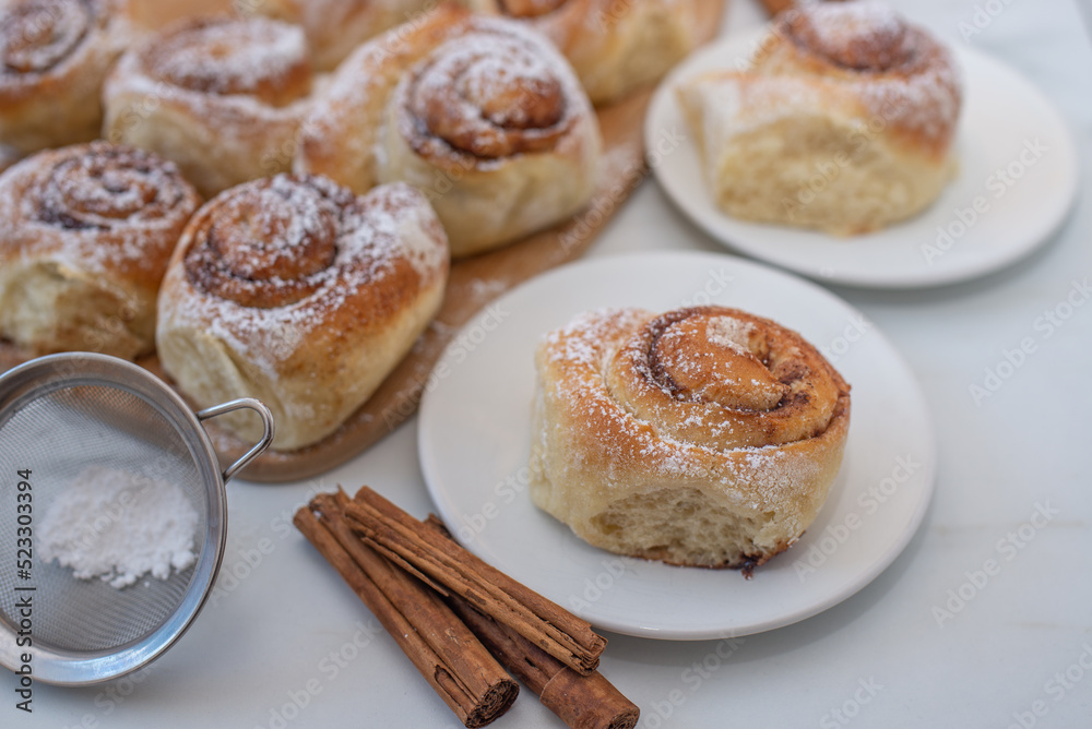 sweet home made cinnamon roll buns on a table