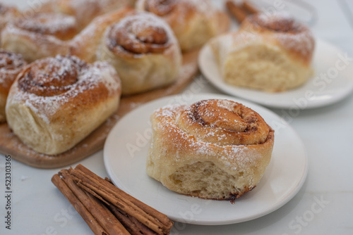 sweet home made cinnamon roll buns on a table © A_Lein