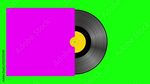 Spinning vinyl record + cover album on green screen background. photo